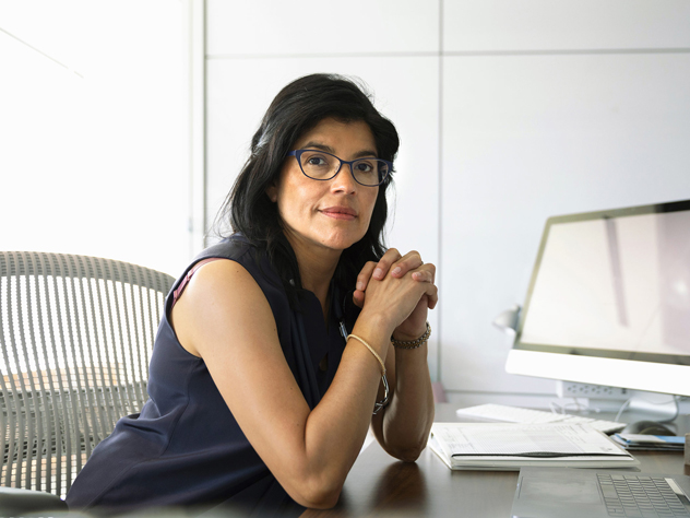 Woman sitting at her desk